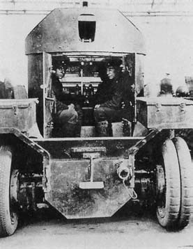 Two of the crew in a Lanchester Armored Car